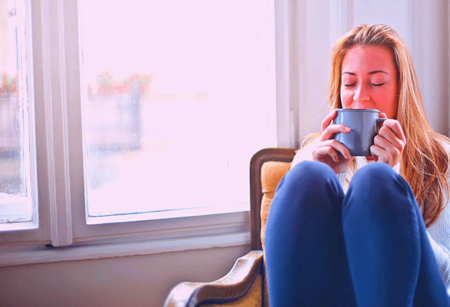 Woman drinking warm drink