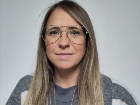 Portrait image of Advance CEO Liz Mack against a plain background